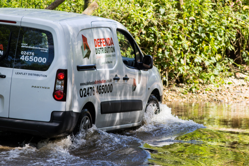 Leaflet Delivery Van in Water